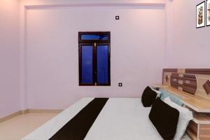 Una cama o camas en una habitación de Hotel O N P Grand and Resort 21 fotos más