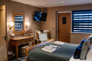 Postel nebo postele na pokoji v ubytování Blue Bell Country Inn