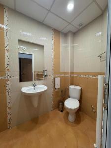 Et badeværelse på Мотел КОМПЛЕКС GRILL and CHILL