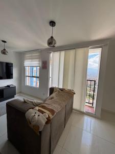 Et tv og/eller underholdning på apartamento familiar