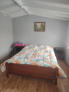 En eller flere senge i et værelse på Departamento