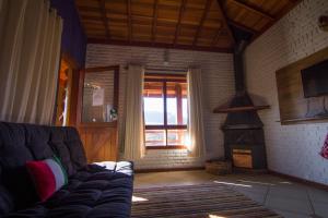 Khu vực ghế ngồi tại Pousada Cabanas no Mundo