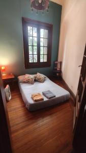 En eller flere senge i et værelse på Casa Pugliese