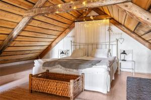 Postel nebo postele na pokoji v ubytování Eksgården Gårdshotell