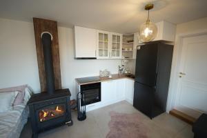 Kuchyň nebo kuchyňský kout v ubytování Vila Horizont Premium