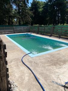 Bazén v ubytování Quinta El Oasis nebo v jeho okolí