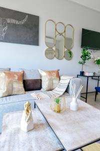 TV a/nebo společenská místnost v ubytování FezatOceanZimbali