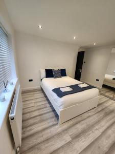 Postel nebo postele na pokoji v ubytování Beautiful, 2 Bedroom House in Tonbridge