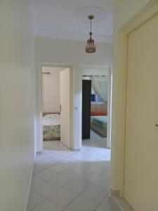 Ένα ή περισσότερα κρεβάτια σε δωμάτιο στο Appartement Spacieux et Lumineux à Tilila +2 φωτογραφίες