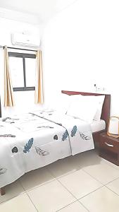 En eller flere senge i et værelse på DS Residence509 + 13 billeder