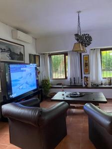 Et tv og/eller underholdning på CasaBlanca El Pinar + 27 billeder