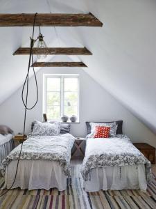 Postel nebo postele na pokoji v ubytování Harrys Hardware Home