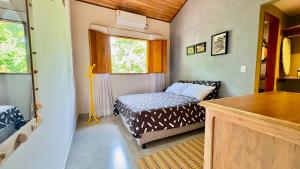 Ένα ή περισσότερα κρεβάτια σε δωμάτιο στο Loft Dreamtime - bem pertinho do Rio das Almas! +43 φωτογραφίες