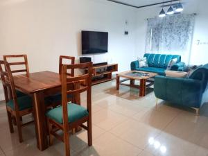 TV a/nebo společenská místnost v ubytování Appartement 3 pièces Calme et élégant - Pfau