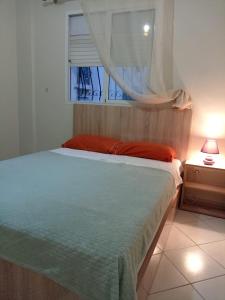 Ένα ή περισσότερα κρεβάτια σε δωμάτιο στο Appartement Spacieux et Lumineux à Tilila