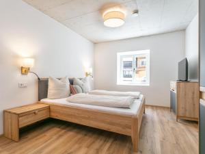 Postel nebo postele na pokoji v ubytování Hopfgarten Alpin Living Top 1