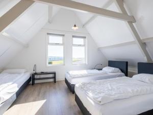 En eller flere senge i et værelse på Bollenzicht