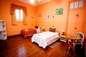 Cama ou camas em um quarto em Lima Wari Hotel Boutique