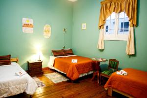 Cama ou camas em um quarto em Lima Wari Hotel Boutique