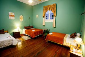 Cama ou camas em um quarto em Lima Wari Hotel Boutique