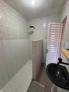 a bathroom with a sink and a shower at Summer House in Jijoca de Jericoacoara +48 photos