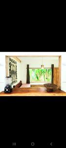 a room with a painting on the wall at BOIPEBA Cantinho do Mirko 3 in Ilha de Boipeba +16 photos