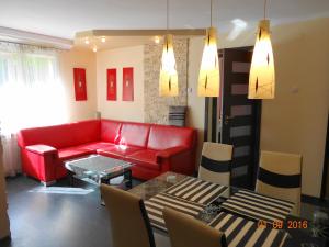 Posedenie v ubytovaní Apartament Kryształowy