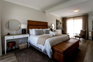 En eller flere senge i et værelse på Tide & Together