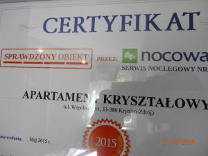 Certifikát, ocenenie alebo iný dokument vystavený v ubytovaní Apartament Kryształowy