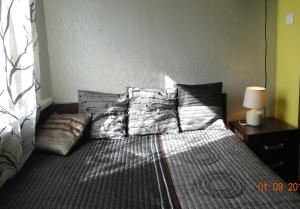 Posteľ alebo postele v izbe v ubytovaní Apartament Kryształowy