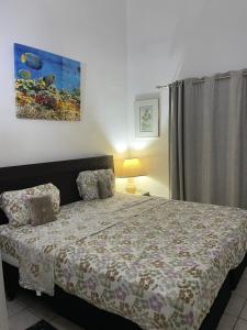 Postel nebo postele na pokoji v ubytování Tropical Harbour View