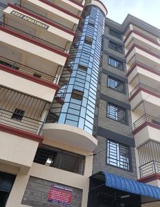 Budova, kde se apartmán nachází + 1 fotografie