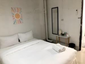 Кровать или кровати в номере XXNEWรอโปร Ohh My Napz Sukhumvit 3 - สุขุมวิท ซอย 3