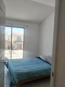 Imagen de la galería de House A in a residential condominium with a pool, en Miranda