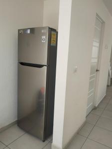 Imagen de la galería de House A in a residential condominium with a pool, en Miranda 13 fotos más