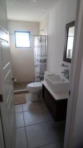 Koupelna v ubytování House A in a residential condominium with a pool