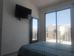 Postel nebo postele na pokoji v ubytování House A in a residential condominium with a pool + 13 fotografií