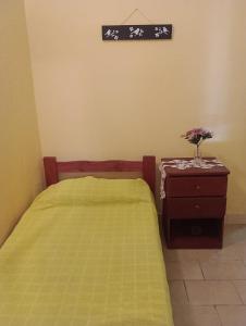 Postel nebo postele na pokoji v ubytování Lo de mis viejos