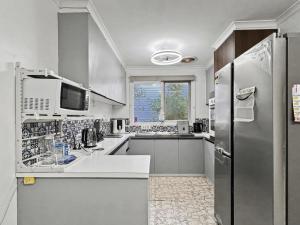 Køkken eller tekøkken på U2 Modern Clayton Retreat