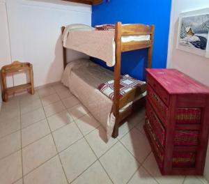 En eller flere senge i et værelse på Departamento De Los Rios