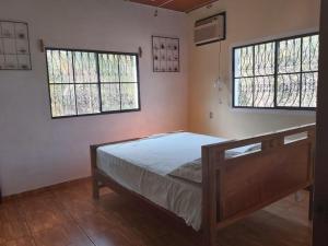 Giường trong phòng chung tại Ahuachapán Getaway