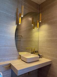 Et badeværelse på Chaloklum Bay Resort - Tranquility Beachfront 101