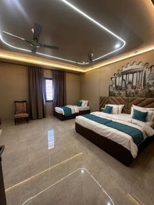 Postel nebo postele na pokoji v ubytování Ambassador Homestay - A Experiential Stay