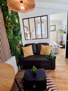 Posezení v ubytování Évasion Tropicale Dépaysement chic - Gare SNCF