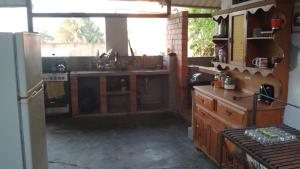 Kuchyň nebo kuchyňský kout v ubytování Habitación Casa Wayllu Pucallpa