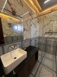 Koupelna v ubytování Ambassador Homestay - A Experiential Stay