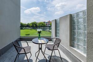 Balkón nebo terasa v ubytování Atour Light Hotel Zhuguang Road Hongqiao National Exhibition and Convention Center