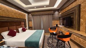 Un pat sau paturi într-o cameră la White Water Resorts