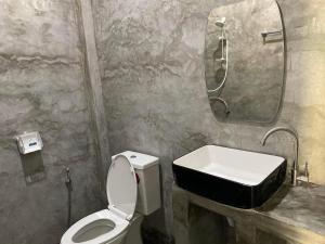 Et badeværelse på Hana House เชียงของ