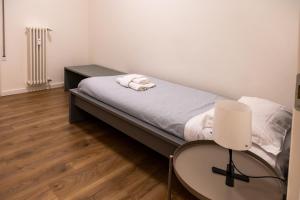 Ένα ή περισσότερα κρεβάτια σε δωμάτιο στο Ca' Martha - A due passi dal centro con parcheggio privato